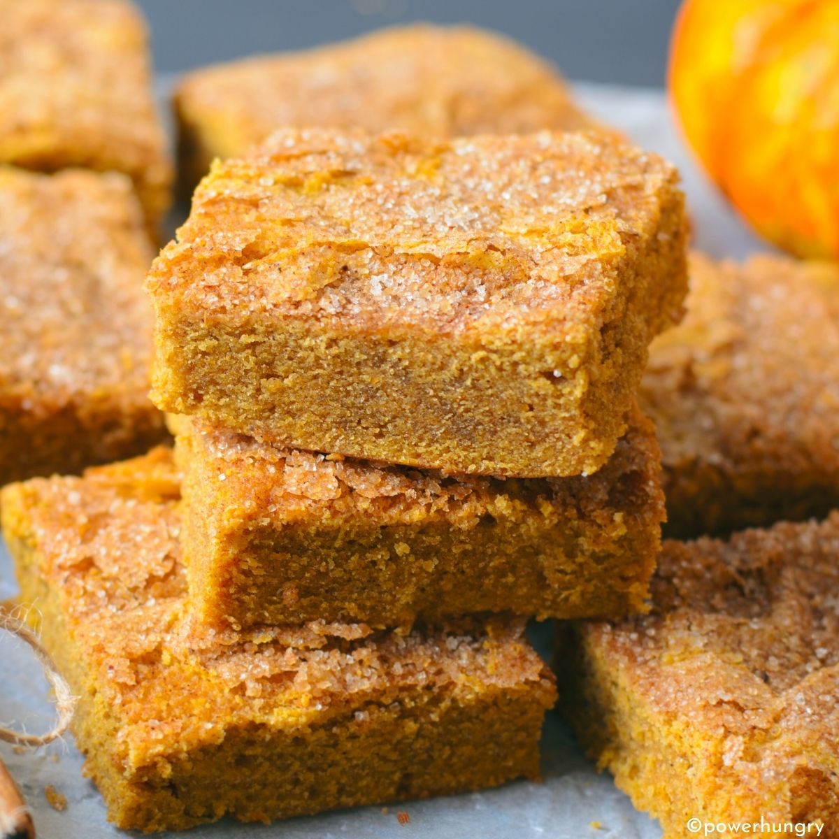 vegan pumpkin protein bars piled against each other