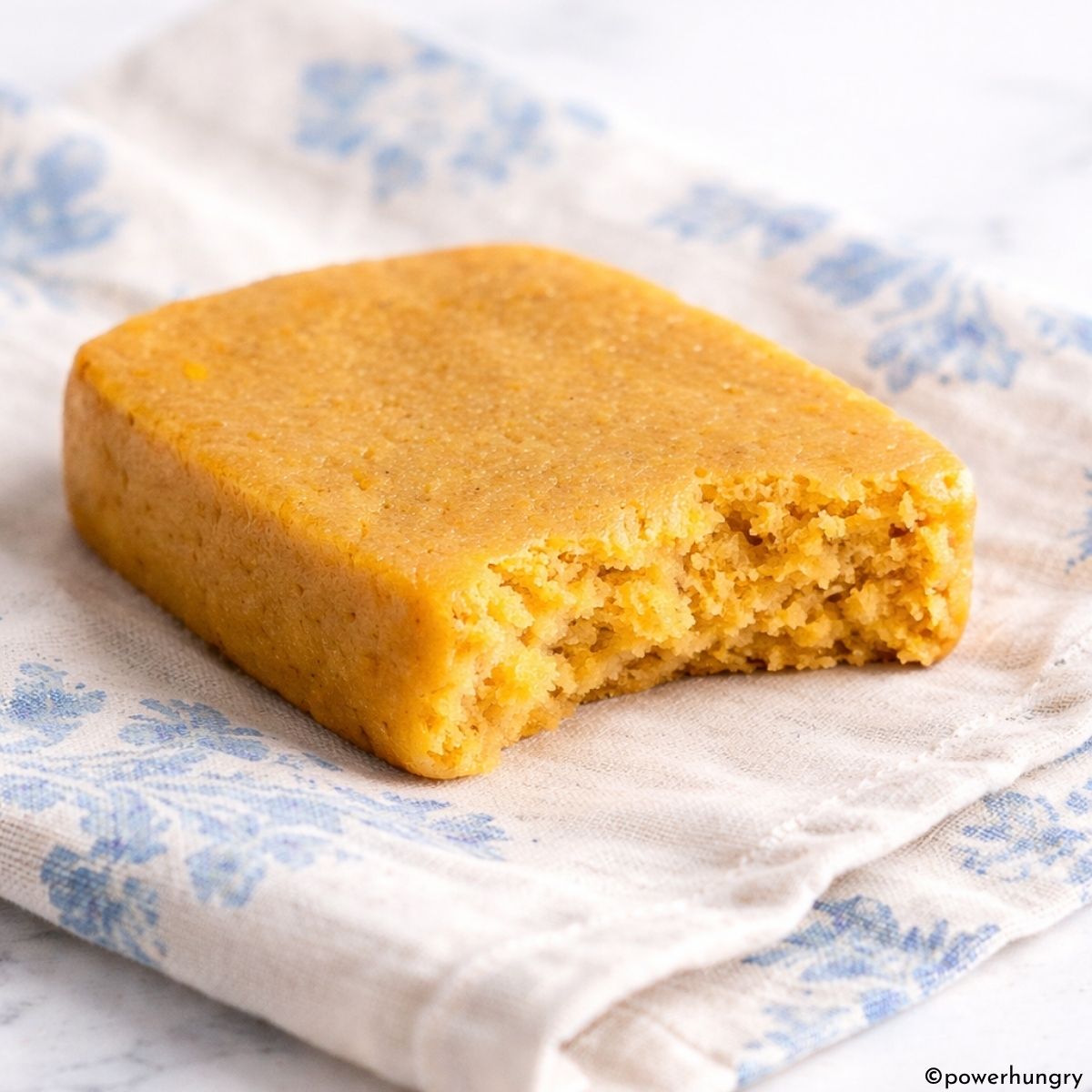 apricot protein bar with a bite taken out