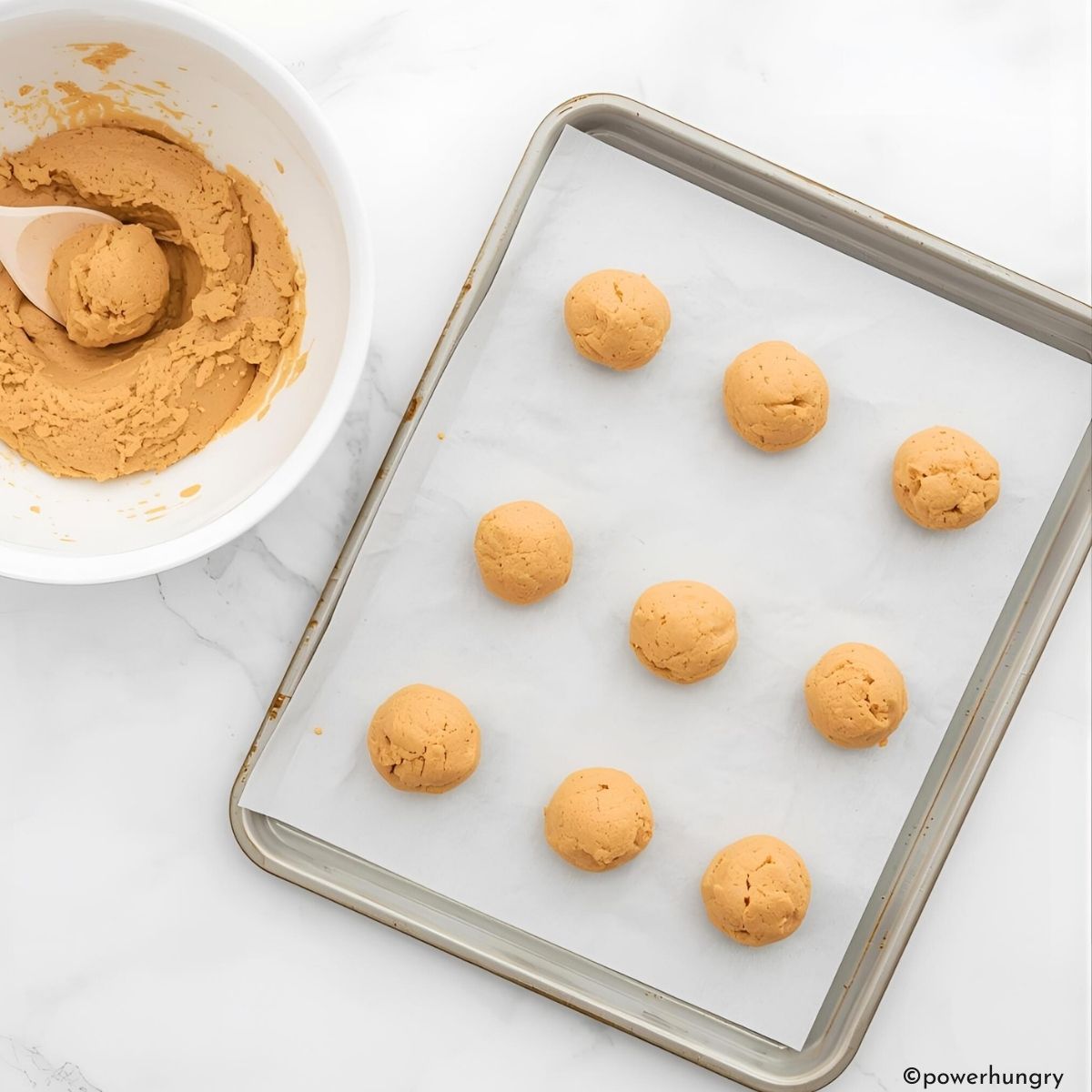 3 ingredient sunflower seed balls on a cookie sheet