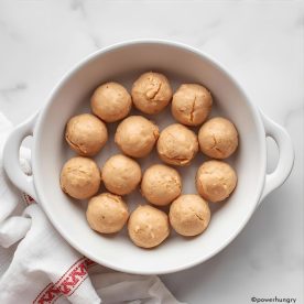 white dish filled with no bake energy balls