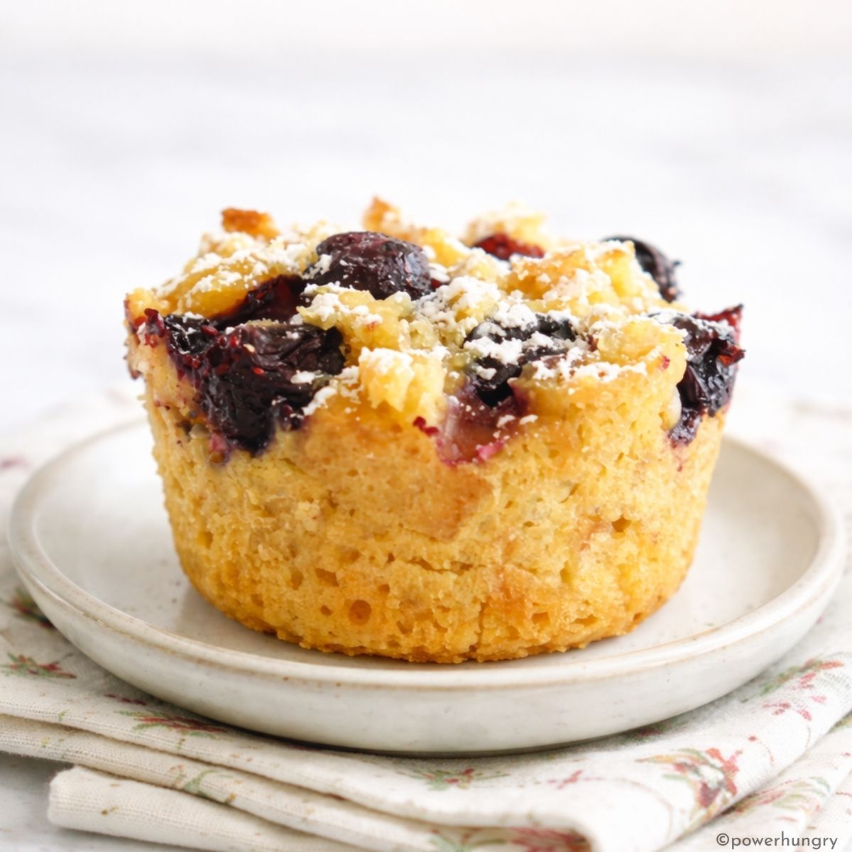 a single vegan french toast muffin on a small plate
