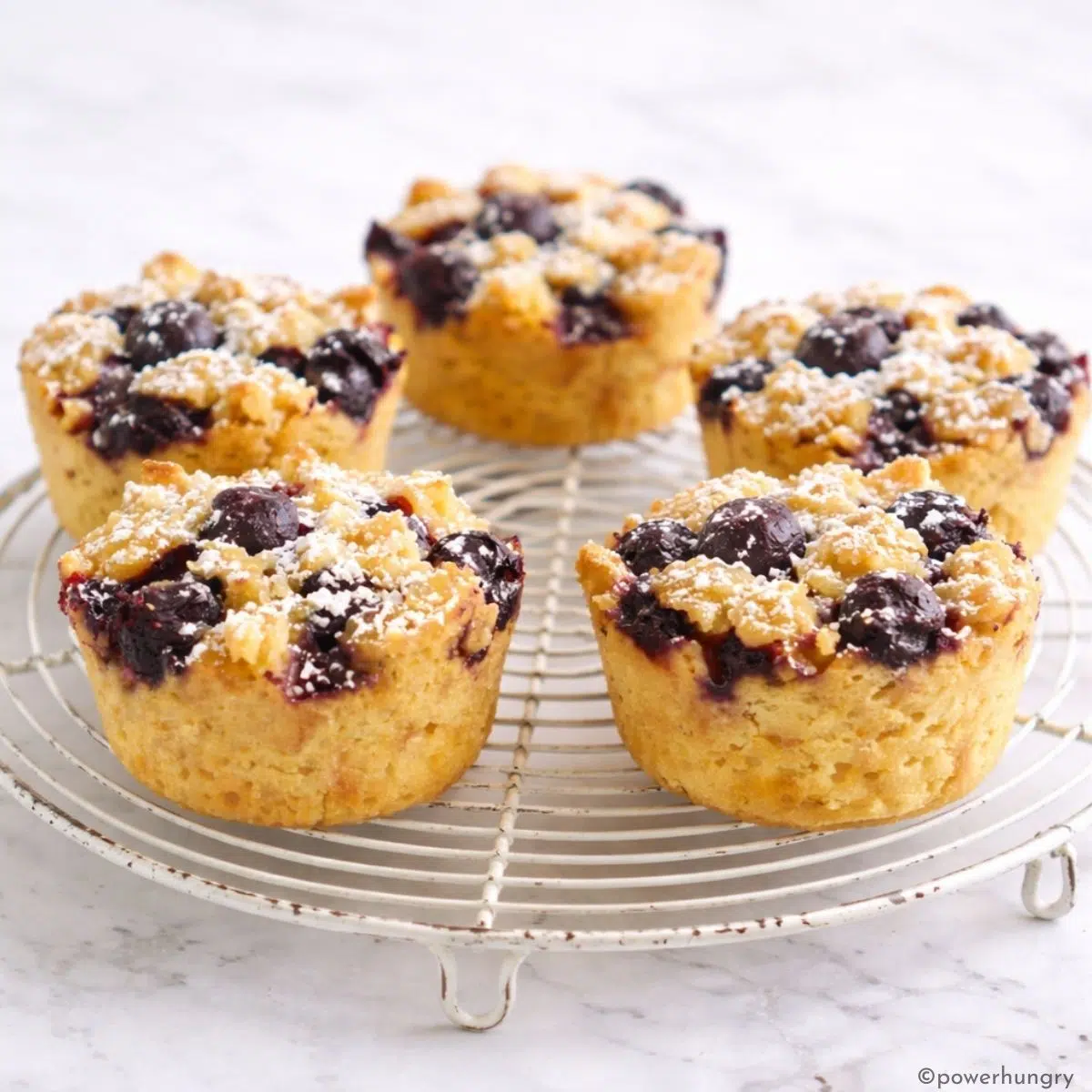 french toast muffins that are vegan, on a cooling rack