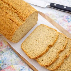 sliced high protein chickpea bread on a cutting board