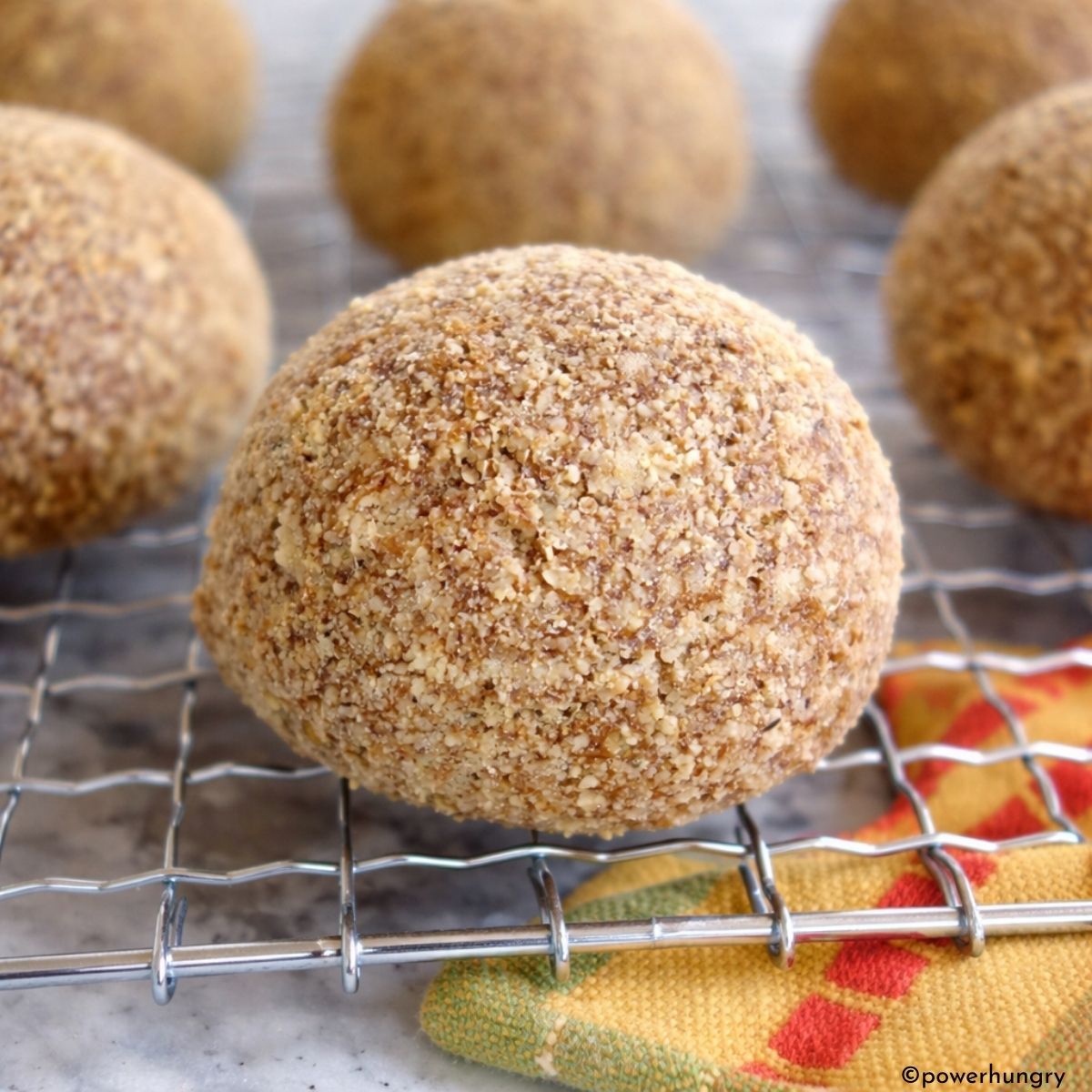 vegan almond flour rolls on a cooling rack