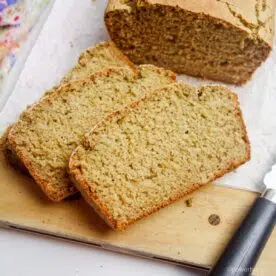 two slices of vegan oat bread on a cutting board