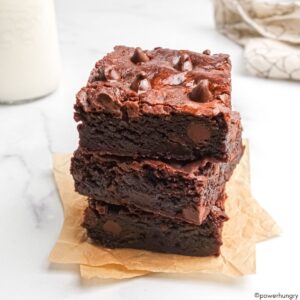a stack of three oat flour vegan brownies