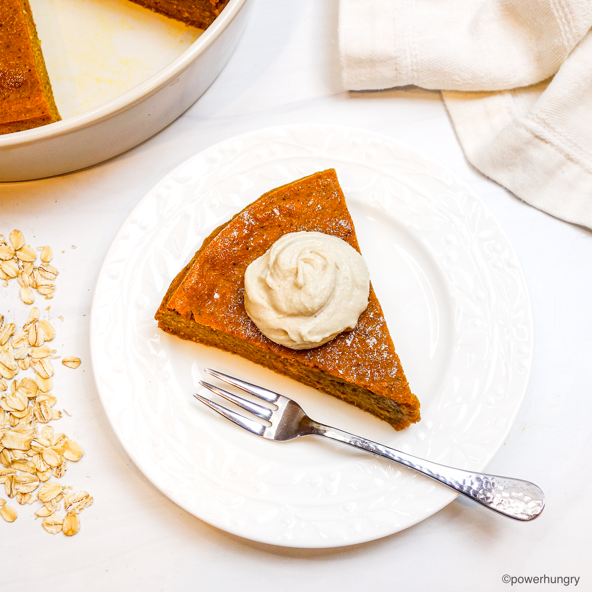 oat pumpkin pie on a white plate