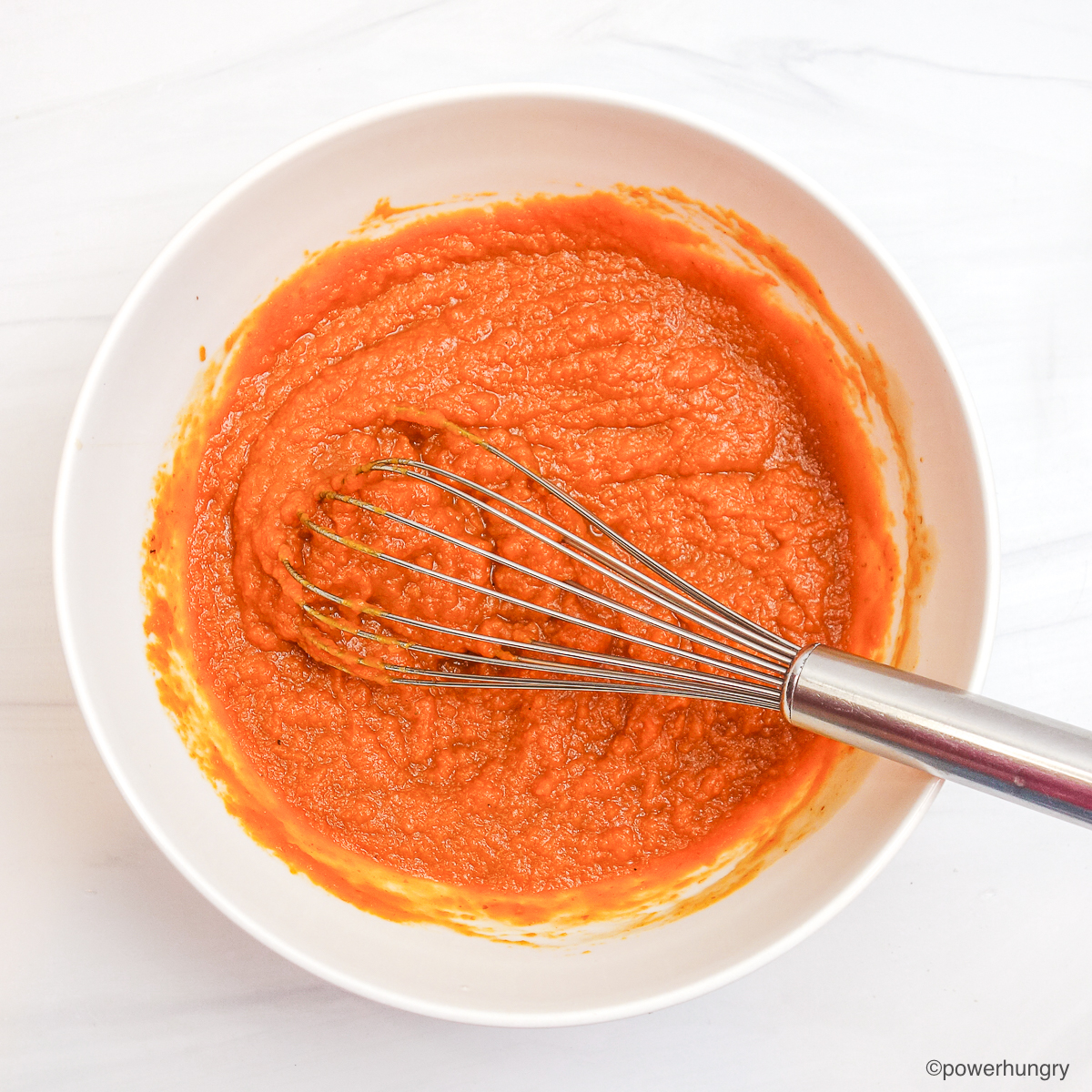 Pumpkin and maple in a white bowl