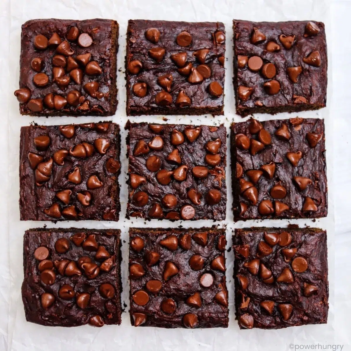 lentil date brownies on a piece of parchment paper