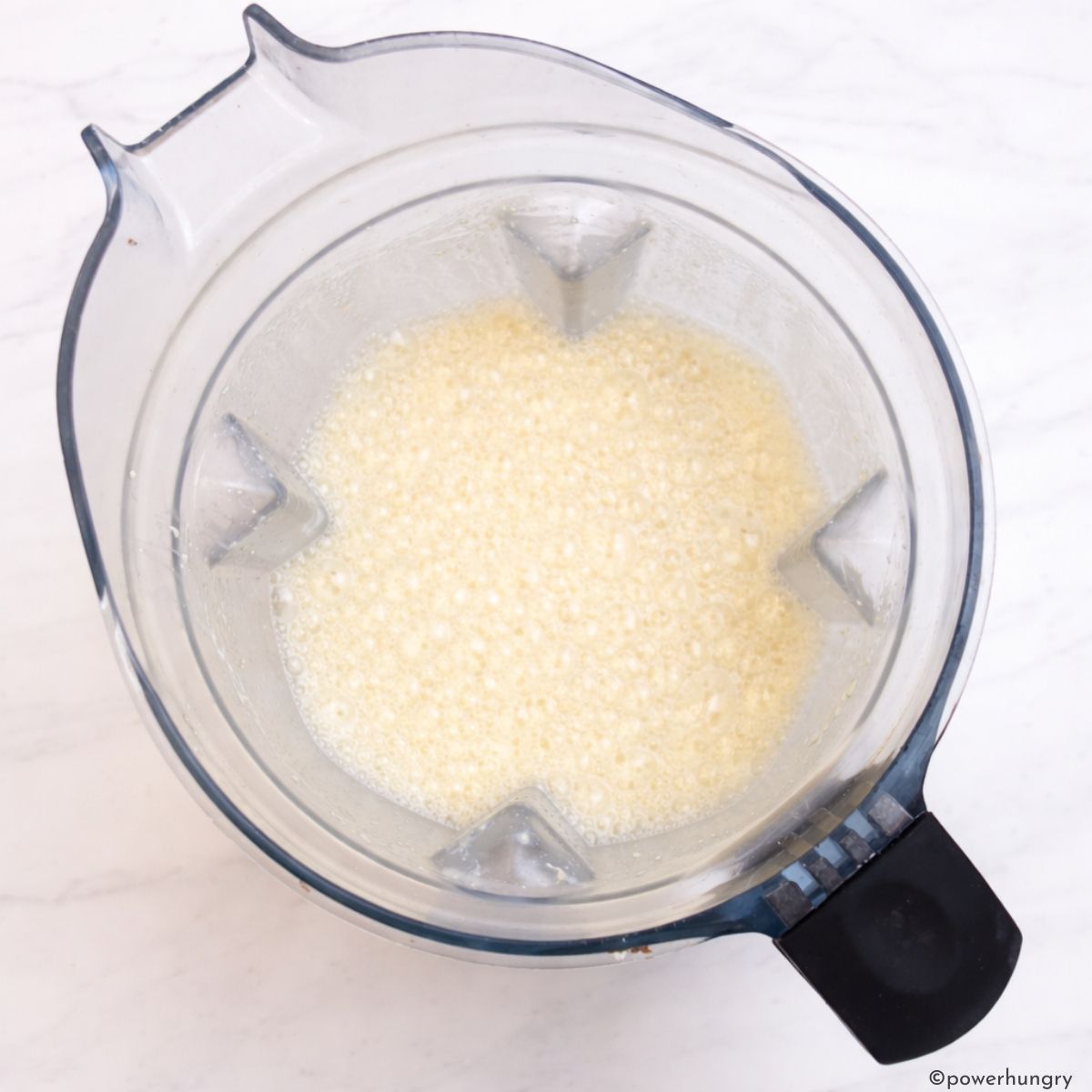 blender with the wet ingredients for high protein millet bread