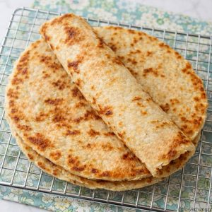 sunflower seed tortillas on a cooling rack
