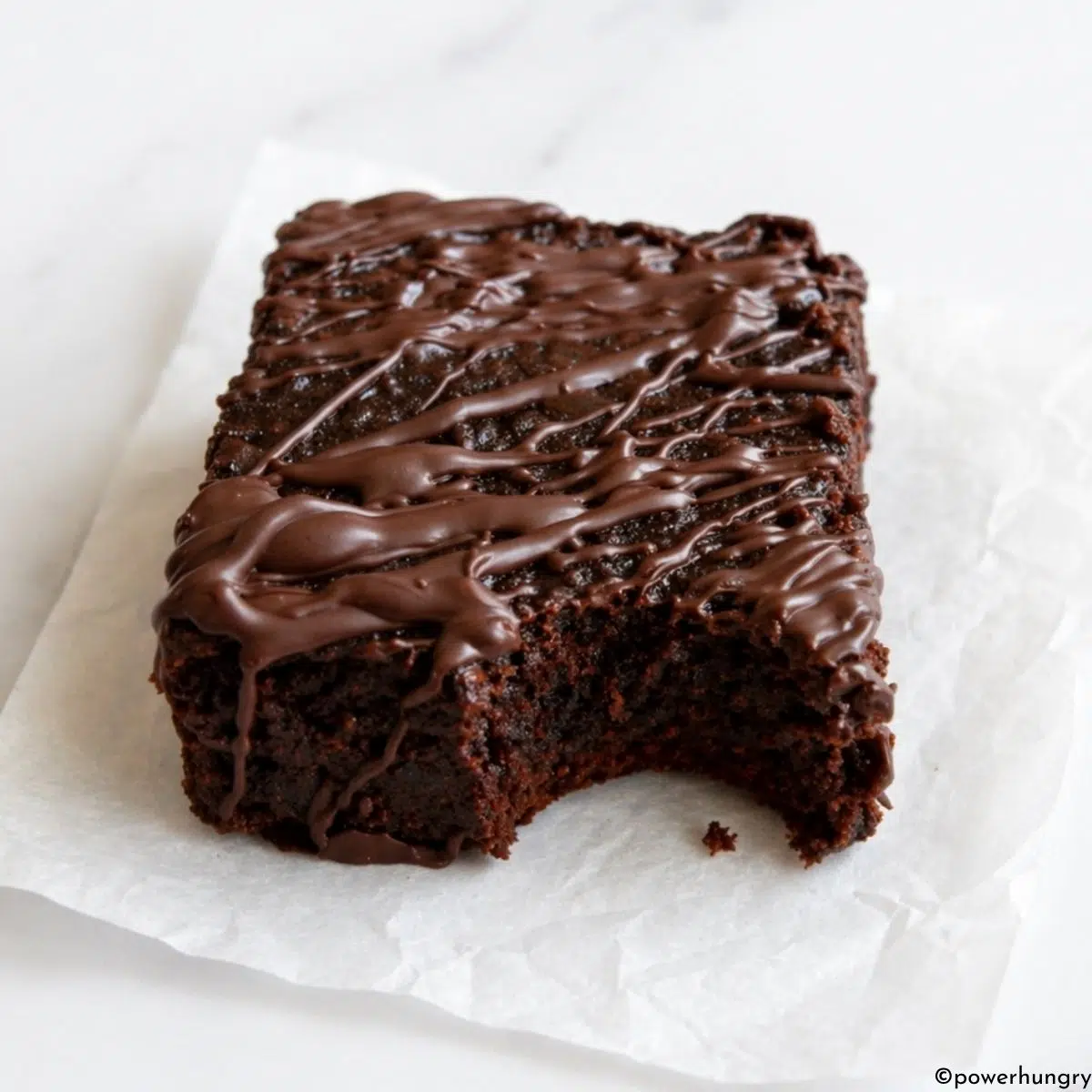 carob almond flour brownie with a bite taken out