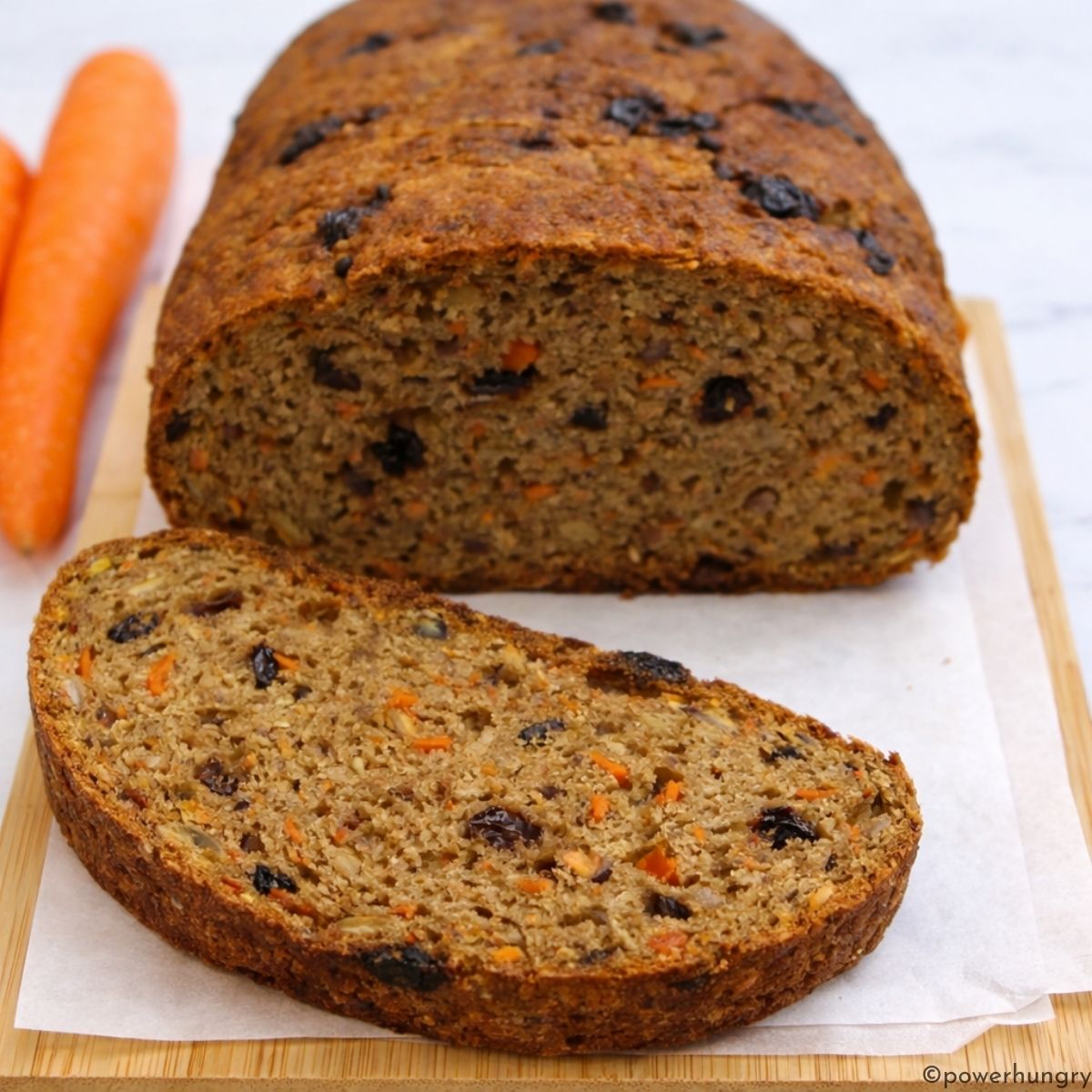 Sliced lentil carrot bread, sliced to reveal interior texture