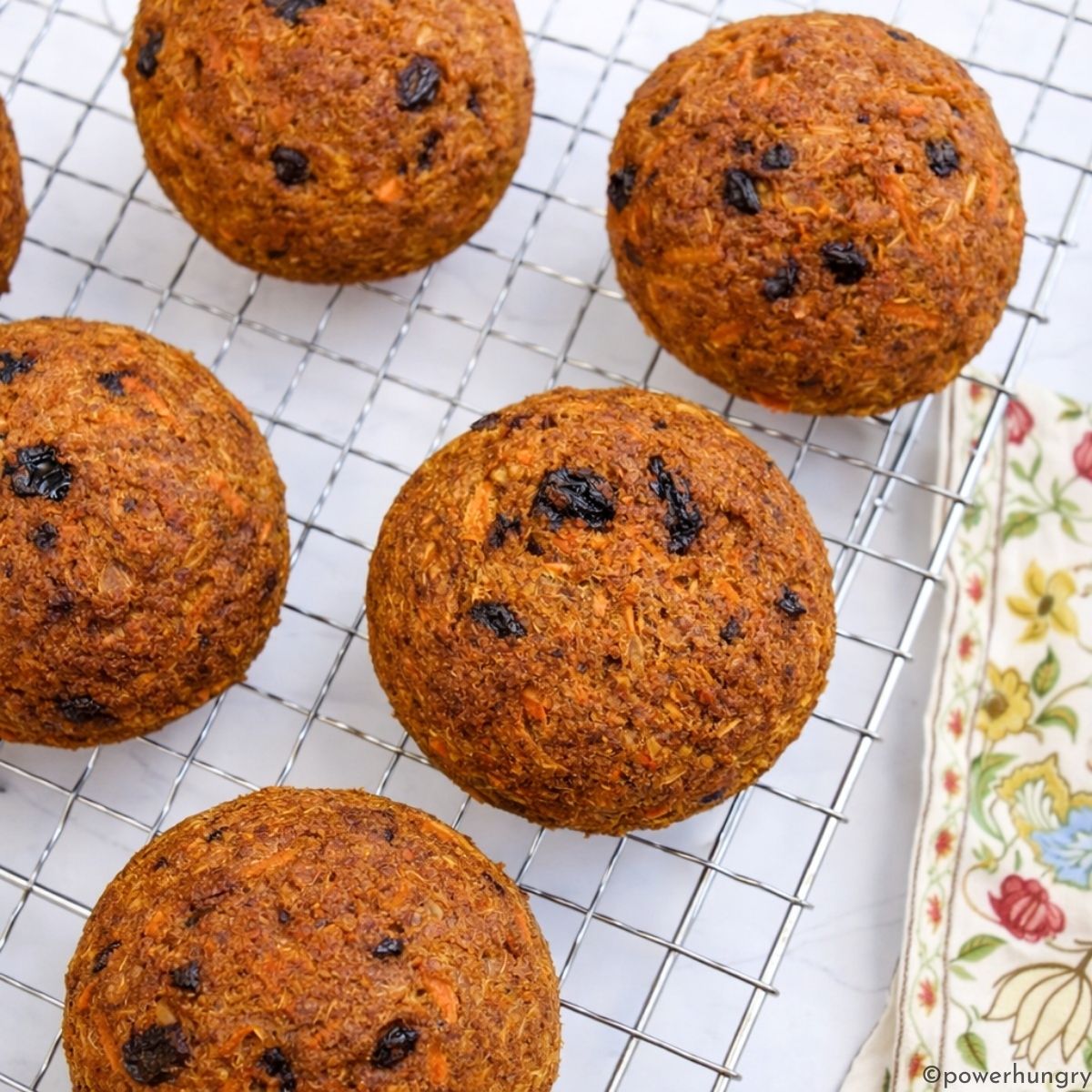 High protein carrot cake bread rolls on a cool8ng rack