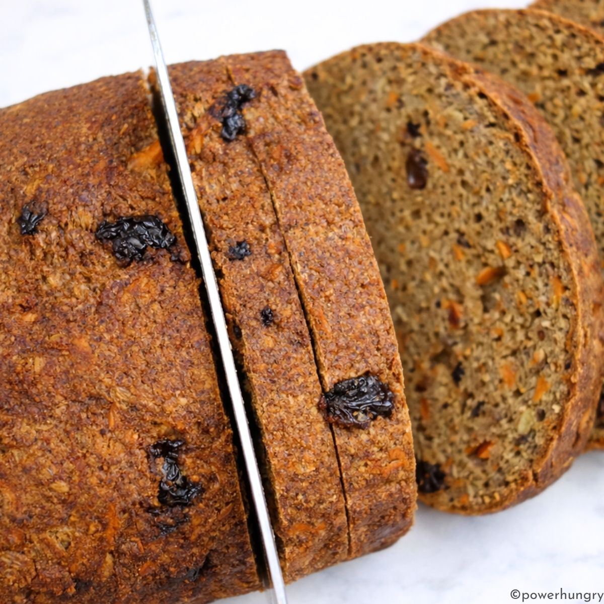 sliced carrot cake lentil bread on a cutting board