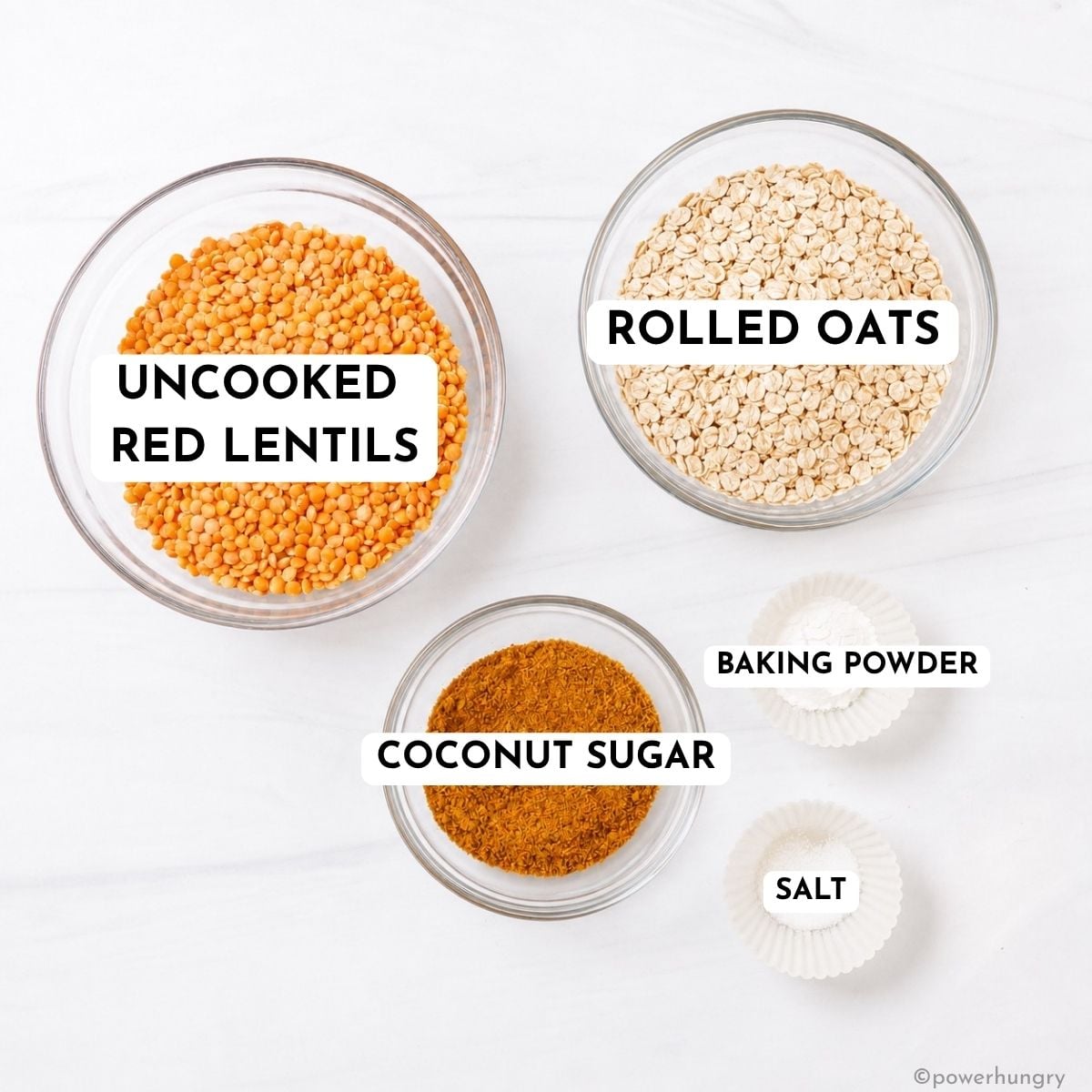 ingredients for red lentil pancakes, in clear glass bowls